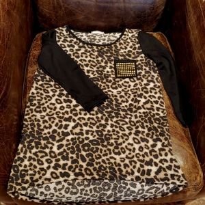 Leopard print Top with Black sleeves.